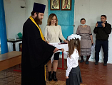 В храме апостола и евангелиста Иоанна Богослова хут. Красный состоялось посвящение в казачата первоклассников МБОУ Красненской СОШ