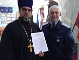 Договор о сотрудничестве подписали директором Шахтинского кадетского корпуса В.А. Бобыльченко и настоятель Алексеевского Архиерейского подворья иерей Евгений Поцелуев