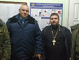 Священник Анатолий Минаев провел беседу с сотрудником МВД Багаевского района и представителями казачества