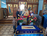 В храме хутора Ажинов дети причастились в праздник Успения Пресвятой Богородицы