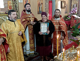 В престольный праздник Никольского храма слободы Кашары, почетным прихожанам вручили грамоты и благодарственные письма