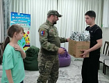 Мужество и благодарность: встреча с героем в детском приюте «Огонек» поселка Каменоломни