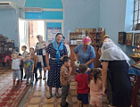 В храме хутора Ажинов дети причастились в праздник Успения Пресвятой Богородицы