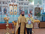 В храме Архистратига Михаила поселка Каменоломни наградили семейных волонтеров